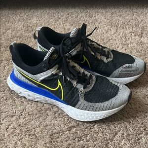 Nike React Infinity Flyknit sneakers with Blue and Yellow Accents